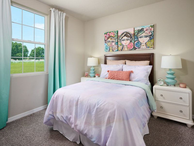 Furnished interior in a model home at The Reserve at Van Oaks in Auburndale (Image 12).