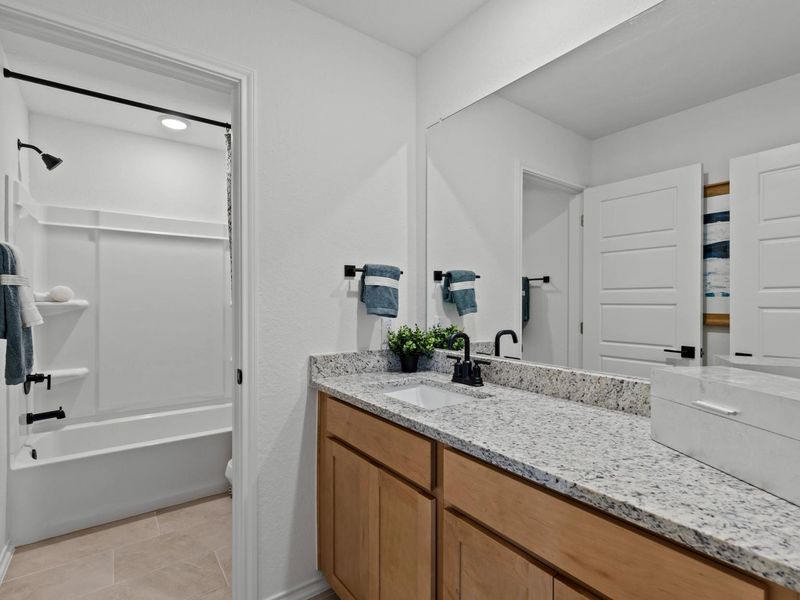 Furnished interior in a model home at Hickory Ridge in Elmendorf (Image 17).