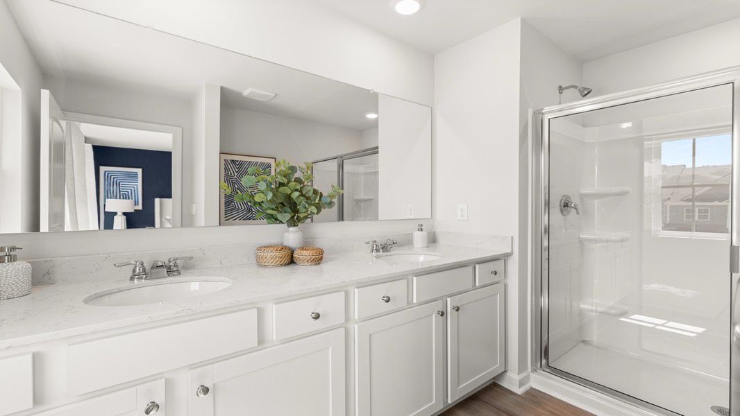 Furnished interior in a model home at Waypoint in Flowery Branch (Image 9).