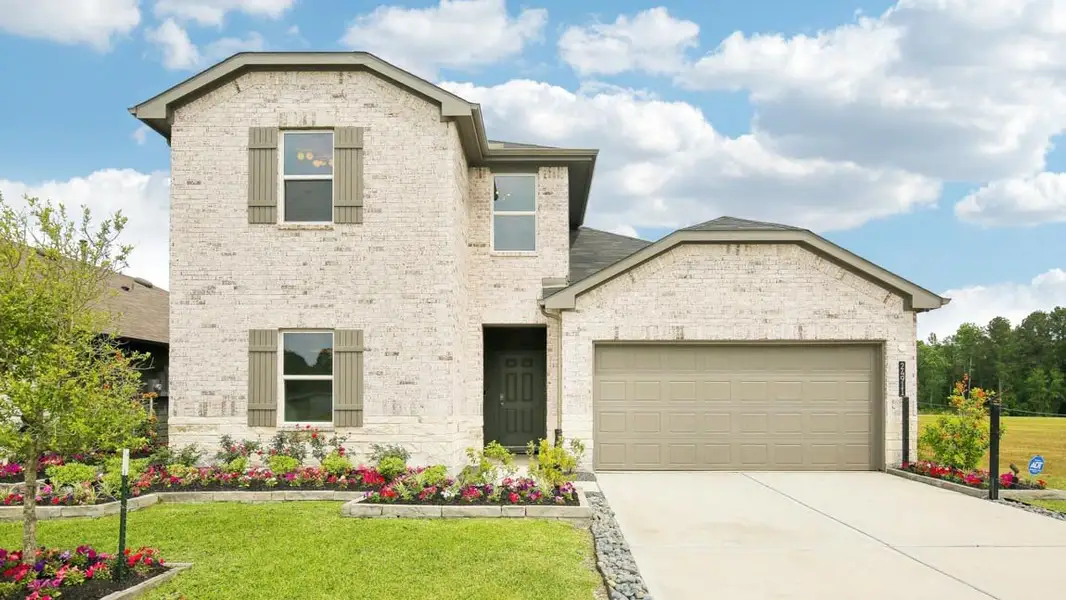 Front exterior of a home in the Grand Pines community, located in Magnolia, TX (Image 3).