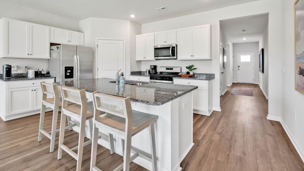 Furnished interior in a model home at Driftwood in Richlands (Image 15).