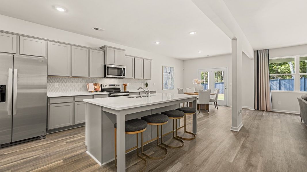 Furnished interior in a model home at Jackson Landing in Jefferson (Image 8).