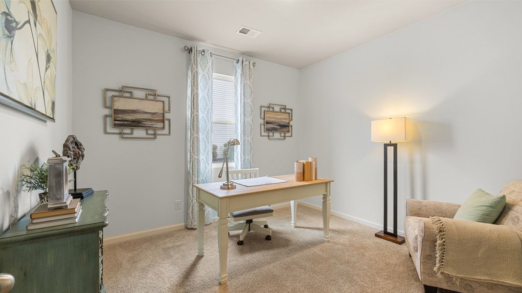 Furnished interior in a model home at Highland Hills in Graniteville (Image 6).