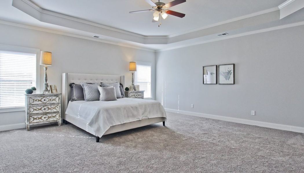 Furnished interior in a model home at Durham Lakes in Fairburn (Image 9).