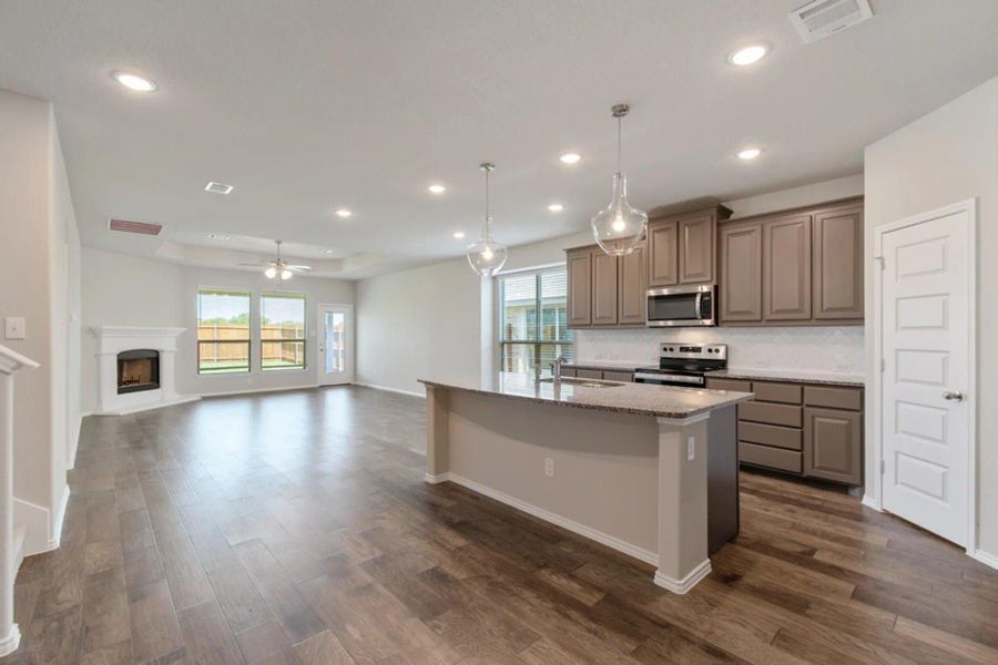 Kitchen to Family Room | Concept 2870 at Summer Crest in Fort Worth, TX by Landsea Homes