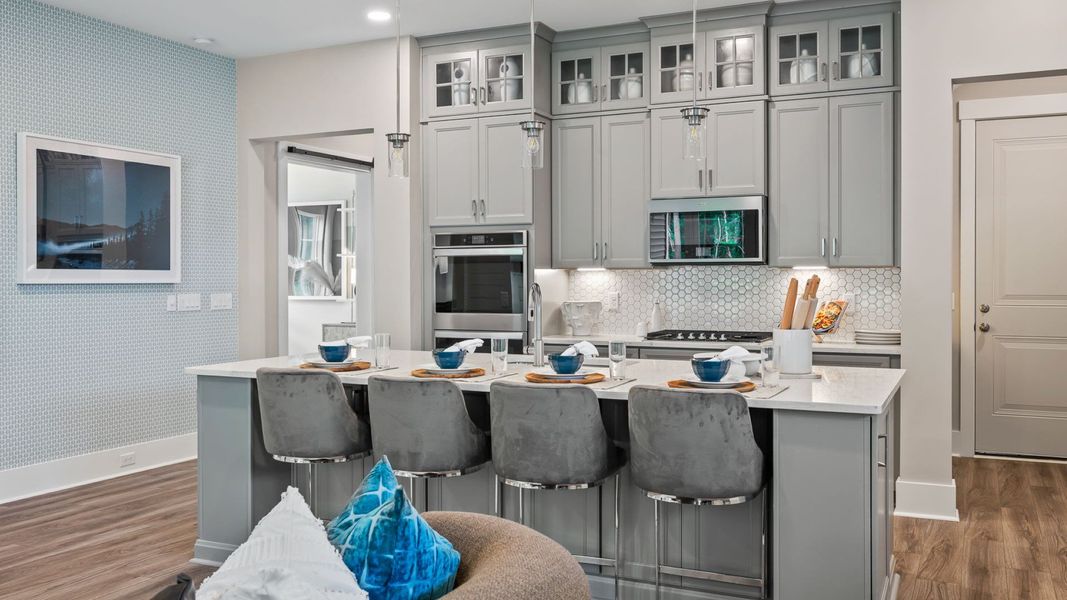 Furnished interior in a model home at Ocean Isle Palms in Shallotte (Image 18).
