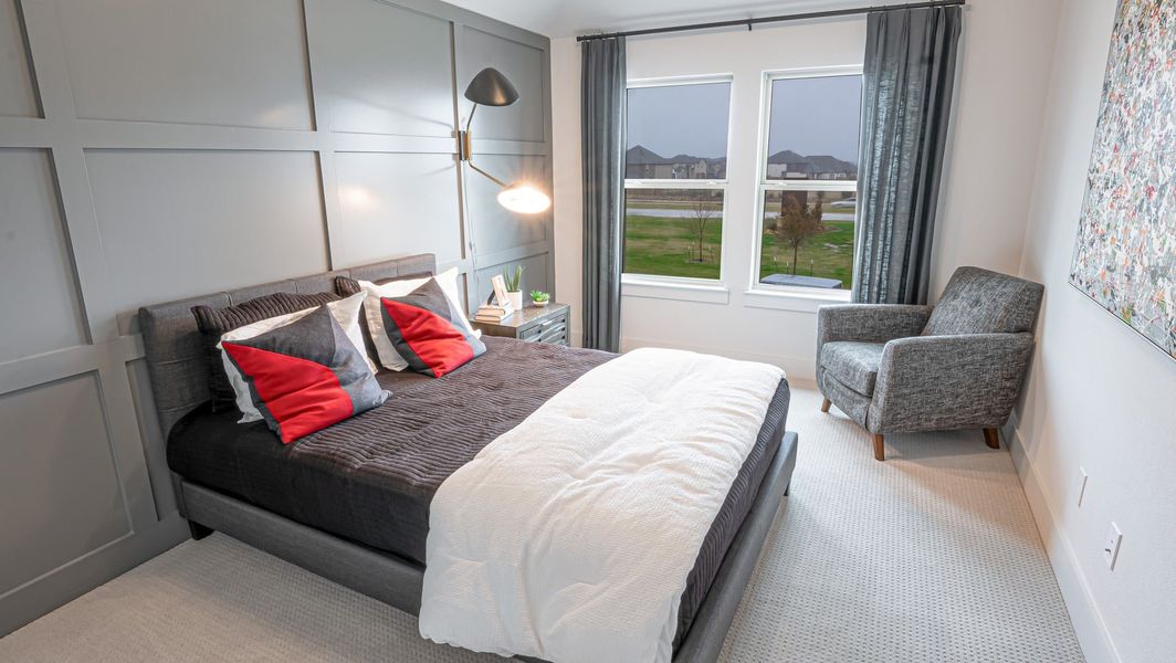 Furnished interior in a model home at Las Lomas in Forney (Image 17).