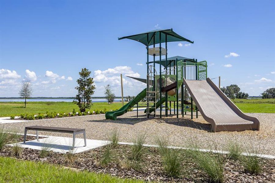 Let little ones climb, slide, and play at the community playground. Let little ones climb, slide, and play at the community playground.