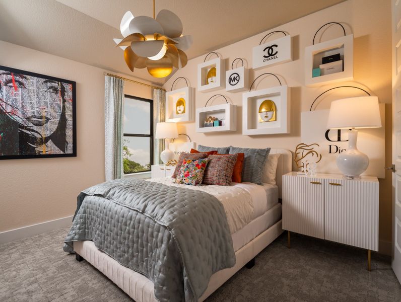 Furnished interior in a model home at Bluffview Reserve in Leander (Image 11).