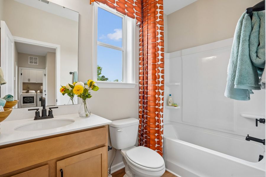 Furnished interior in a model home at South Lake Townes at Flowers Plantation in Clayton (Image 44).