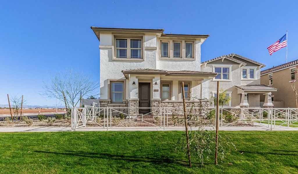 Front exterior of a home in the Fusion at Blossom Rock community, located in Apache Junction, AZ (Image 6).