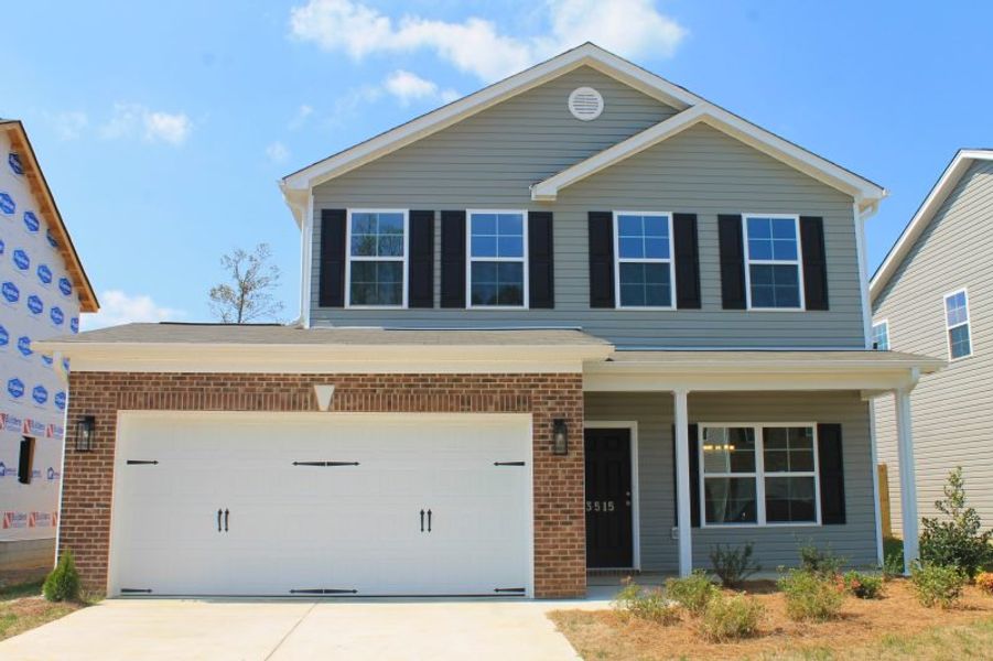 Front exterior of a home in the The Wilcox community, located in Greensboro, NC (Image 15).