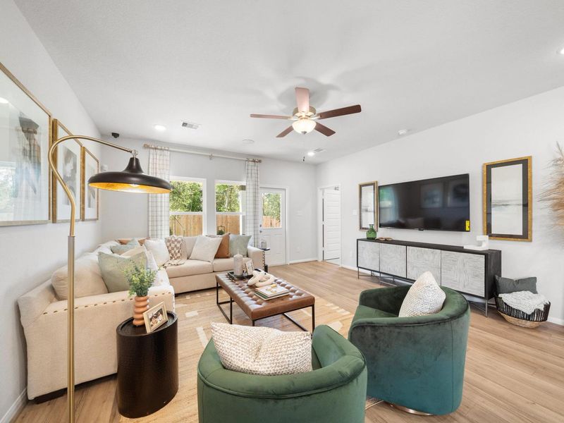 Furnished interior in a model home at Caney Creek Place in Conroe (Image 5).
