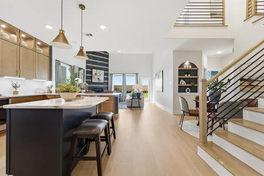 Furnished interior in a model home at Wildrye in Waller (Image 10).