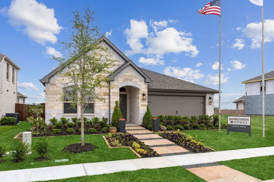 Front exterior of a home in the De Berry Reserve community, located in Royse City, TX (Image 2).