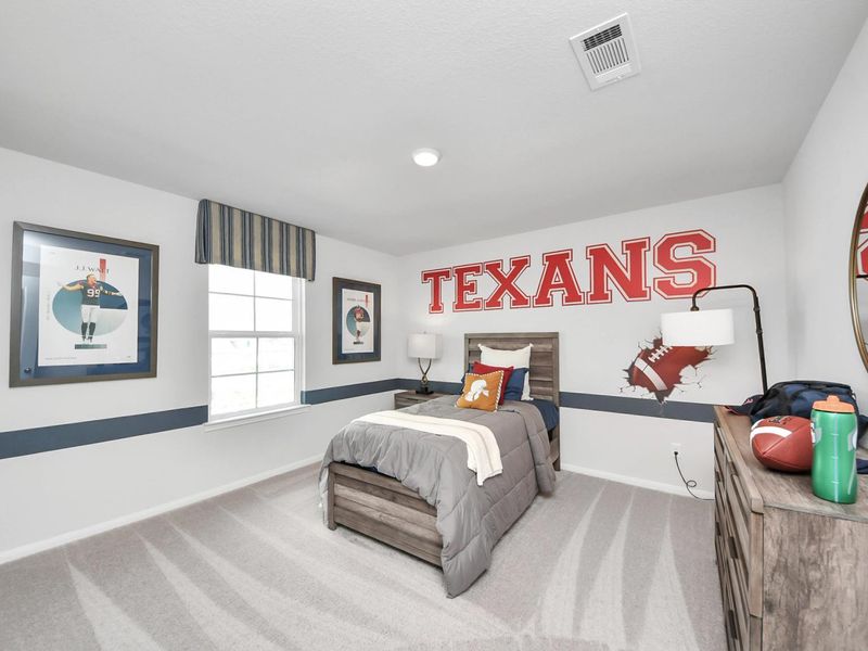 Furnished interior in a model home at Sunterra in Katy (Image 34).