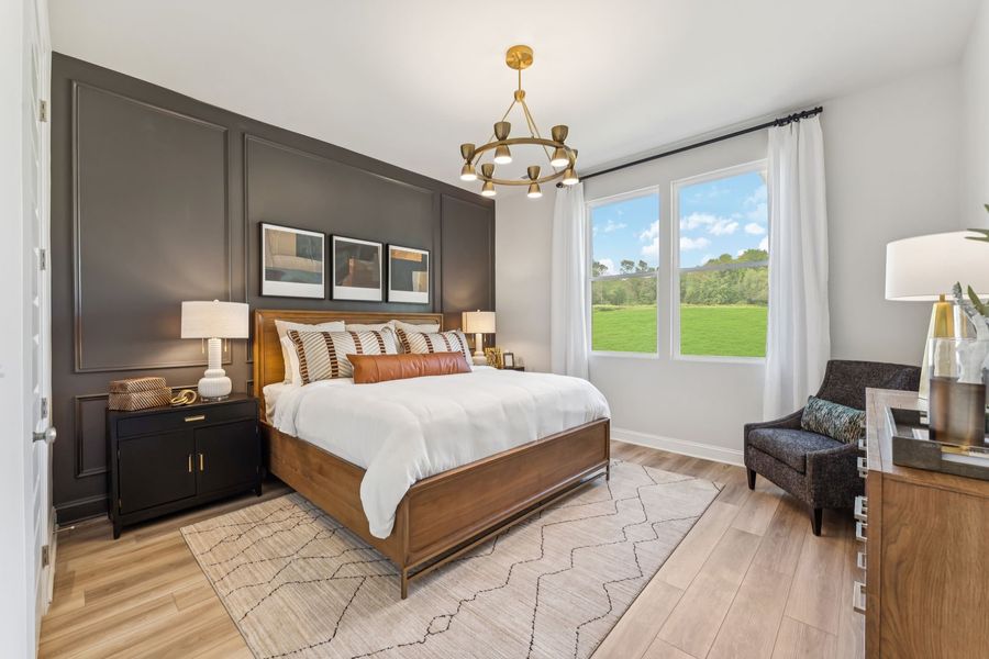 Featuring spacious main level primary suites