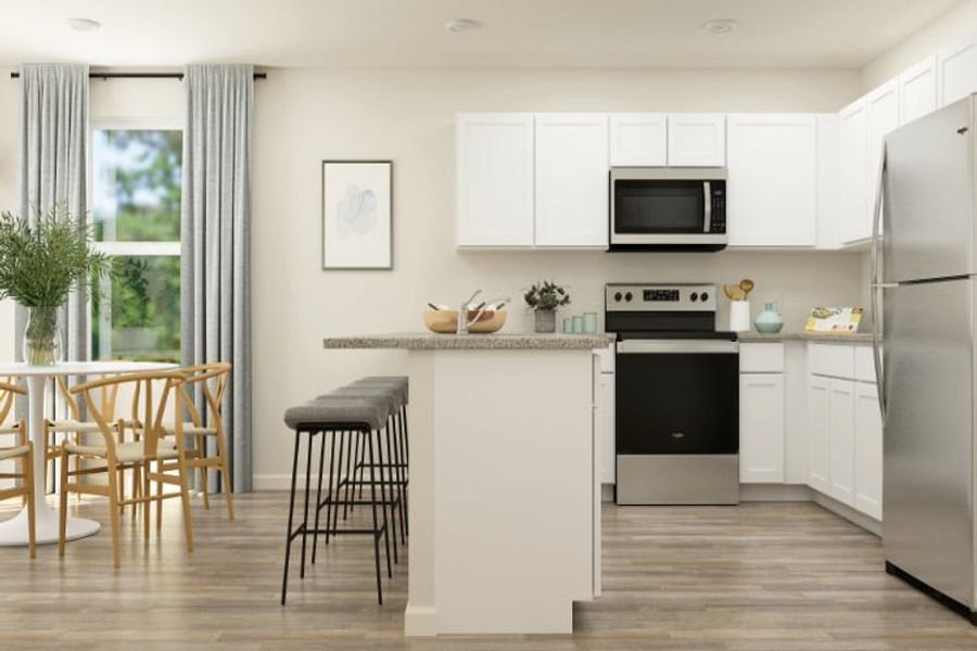 A kitchen with white cabinets. A kitchen with white cabinets.