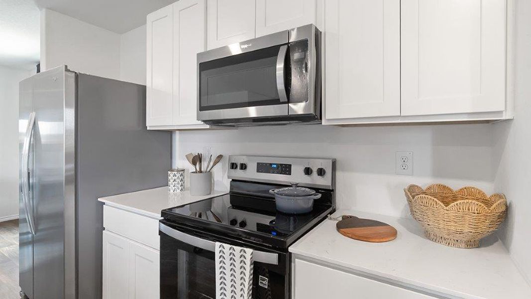 Furnished interior in a model home at Lucero in San Antonio (Image 12).