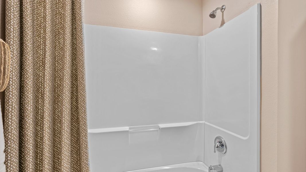 Furnished interior in a model home at The Cottages in Corpus Christi (Image 21).