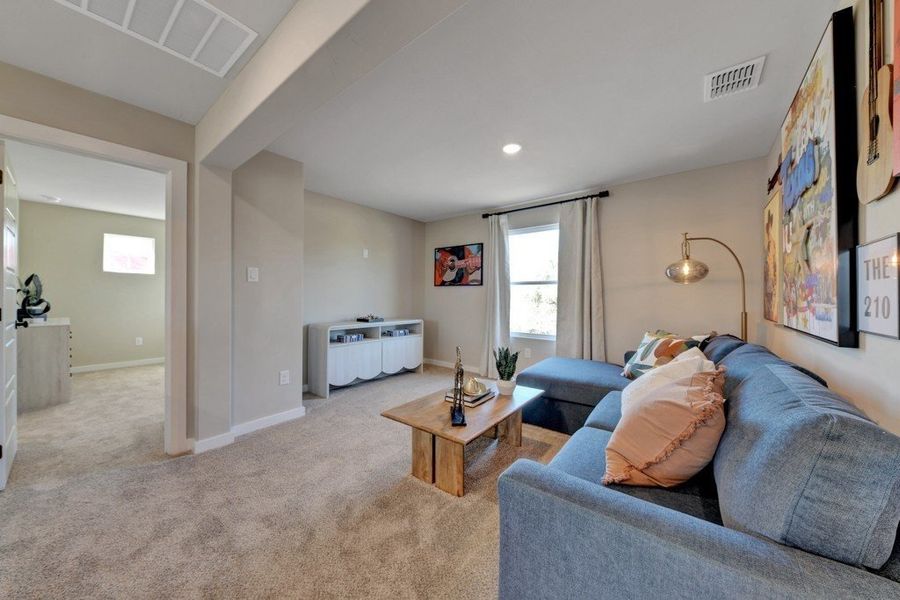 Furnished interior in a model home at Veranda Designer in San Antonio (Image 29).