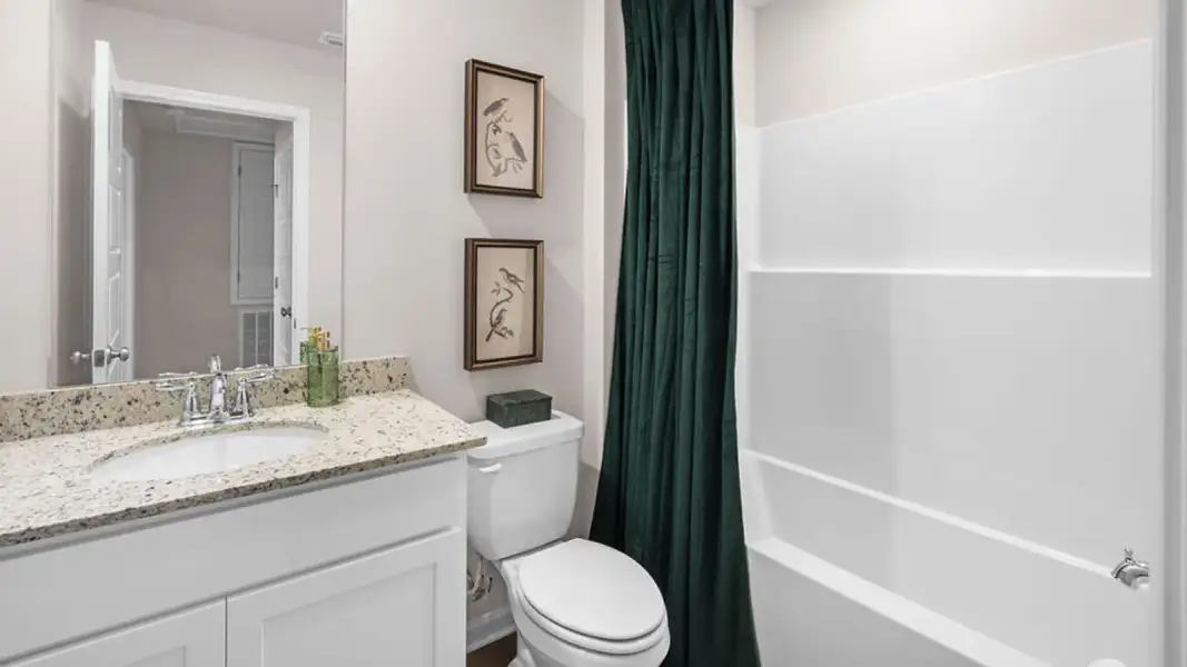 Furnished interior in a model home at Horseman's Bluff in Tallahassee (Image 19). Furnished interior in a model home at Horseman's Bluff in Tallahassee (Image 19).
