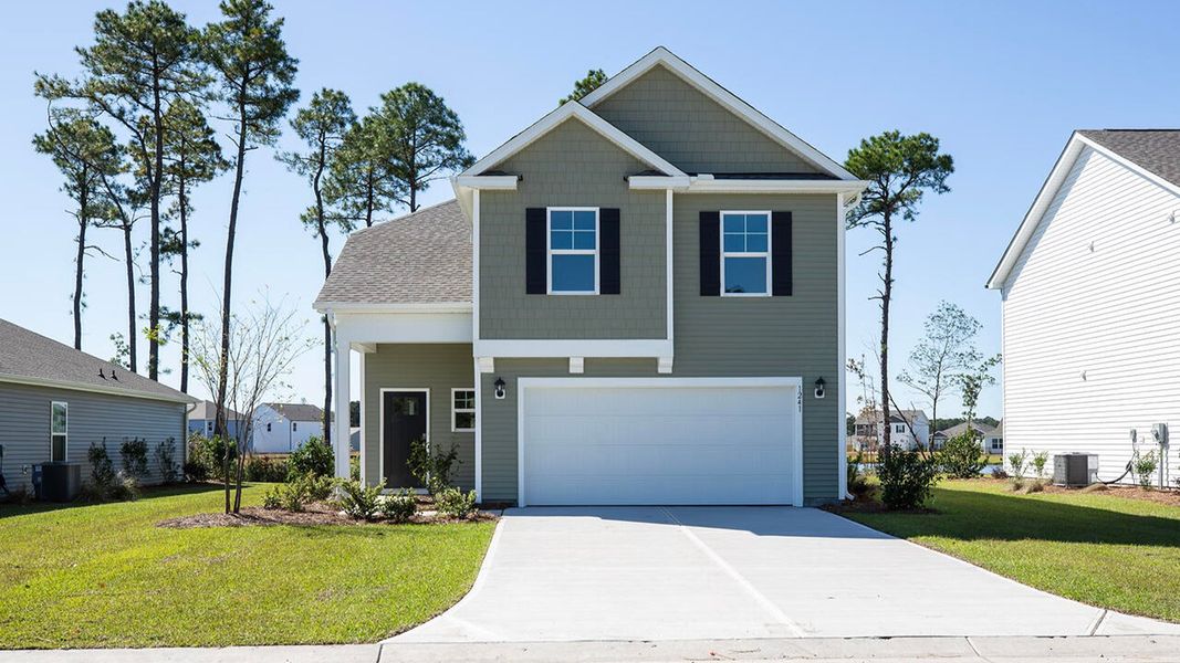 Front exterior of a home in the Sidbury Station community, located in Castle Hayne, NC (Image 4).