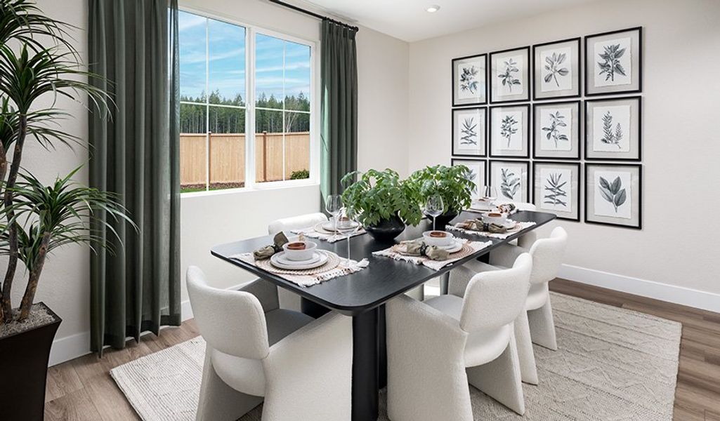Furnished interior in a model home at Peaceful Ridge in Colorado Springs (Image 5).