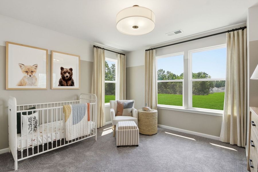 Furnished interior in a model home at Clairmont in Charlotte (Image 27).