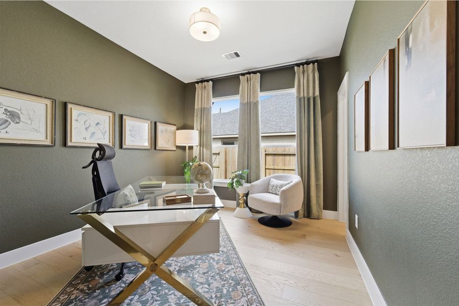 Furnished interior in a model home at Sundance Cove in Crosby (Image 6).