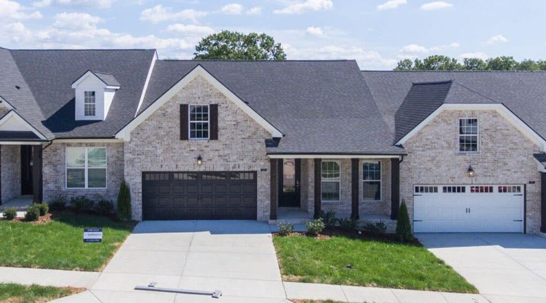 Front exterior of a home in the Stonecrest Townhomes community, located in Hendersonville, TN (Image 11).