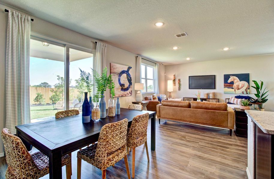 Santiago model dining room and great roomfrom Blue Ridge Ranch in San Antonio by Century Communities