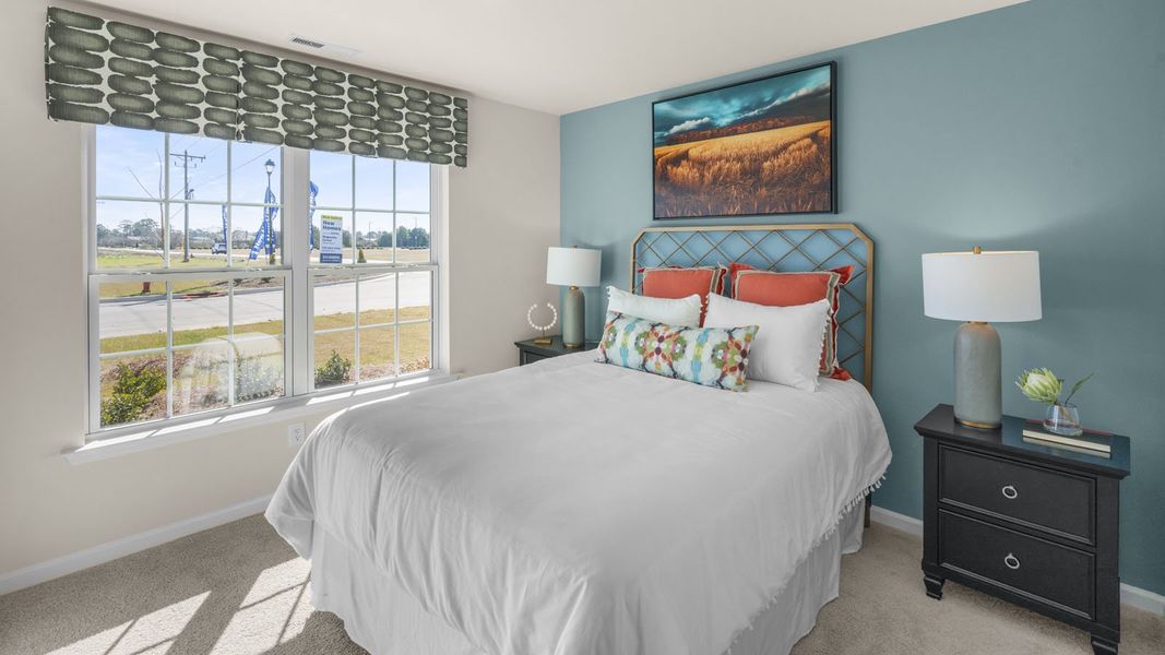 Furnished interior in a model home at Magnolia Grove in Goldsboro (Image 25).