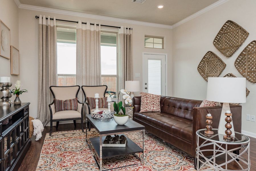 Furnished interior in a model home at The Estates at Vintage Farms in Brenham (Image 3).