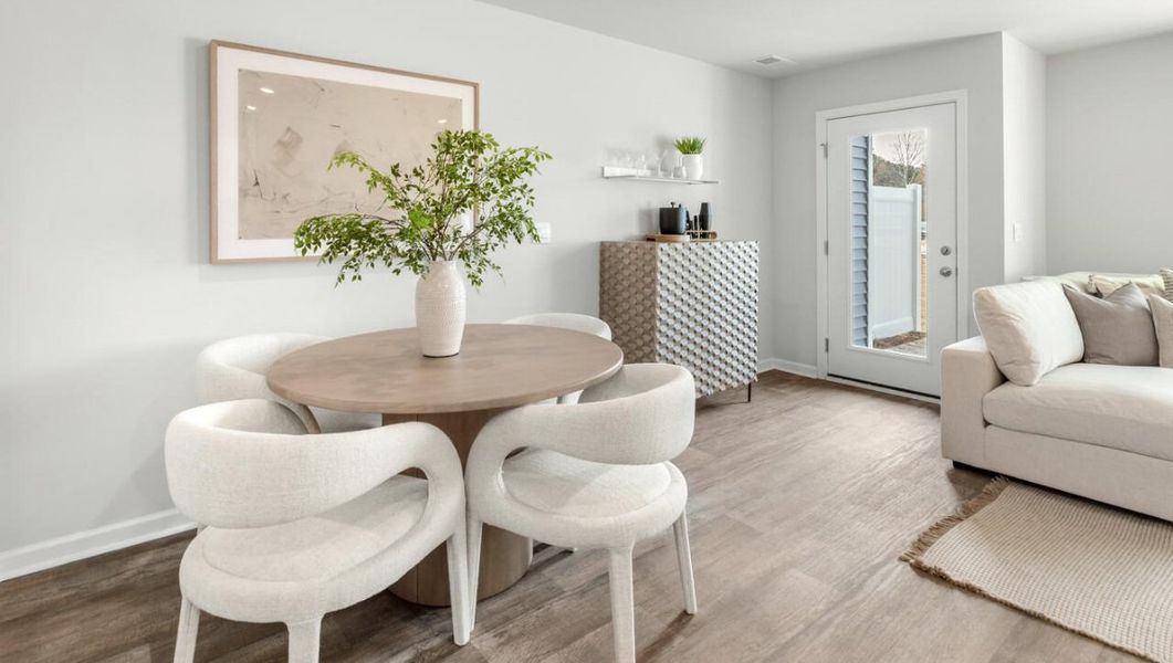 Furnished interior in a model home at Waterside Townhomes in Surf City (Image 10).