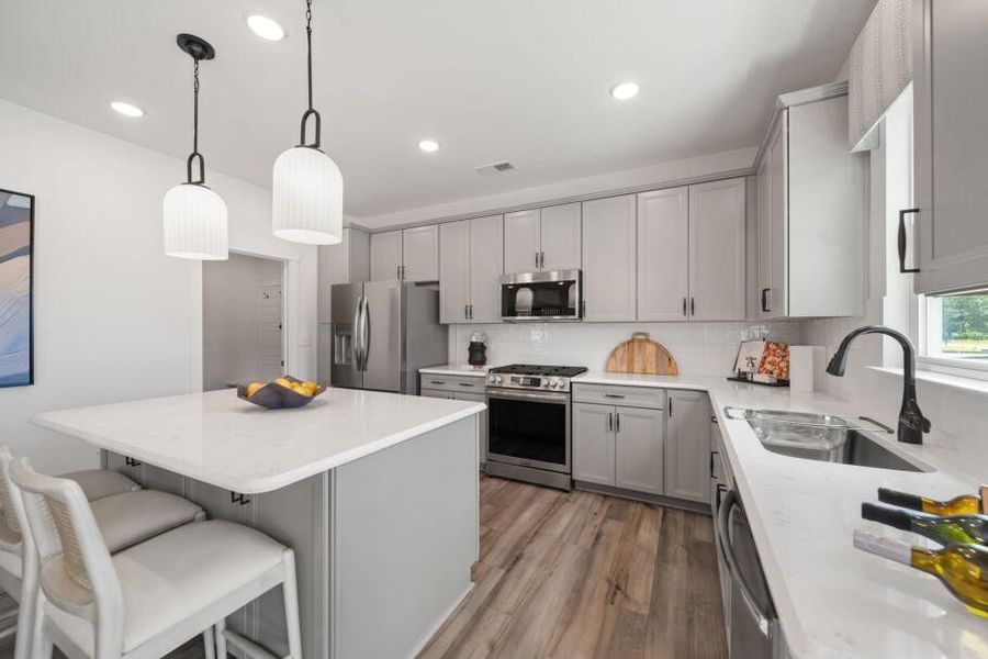 Furnished interior in a model home at Hayes Village in Greensboro (Image 6).