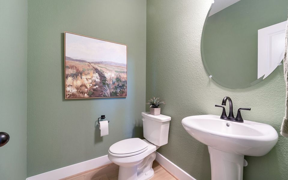 Furnished interior in a model home at Grande Estates in Bertram (Image 6).