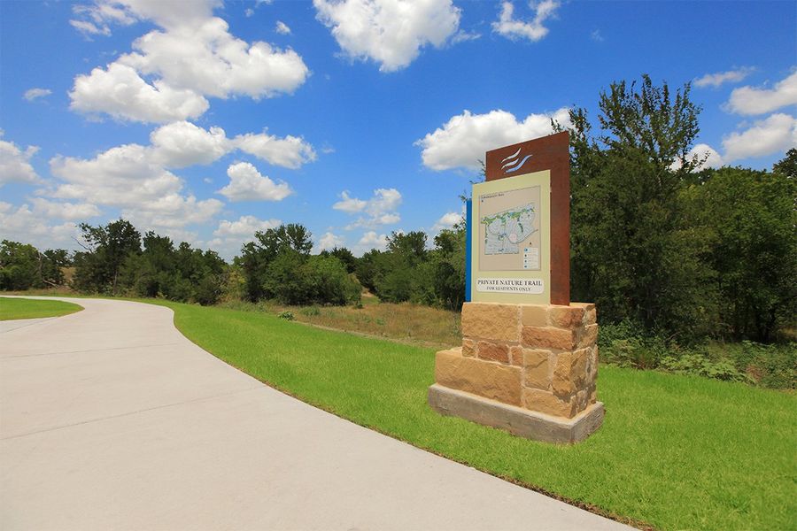 Entrance to the Elevon community in Lavon, TX, featuring signage and landscaping (Image 1). Entrance to the Elevon community in Lavon, TX, featuring signage and landscaping (Image 1).