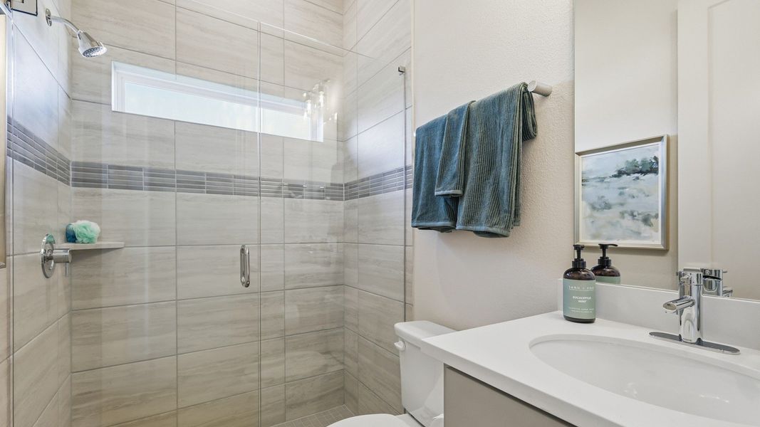 Furnished interior in a model home at Lakeshore Bluffs in Shady Shores (Image 12).