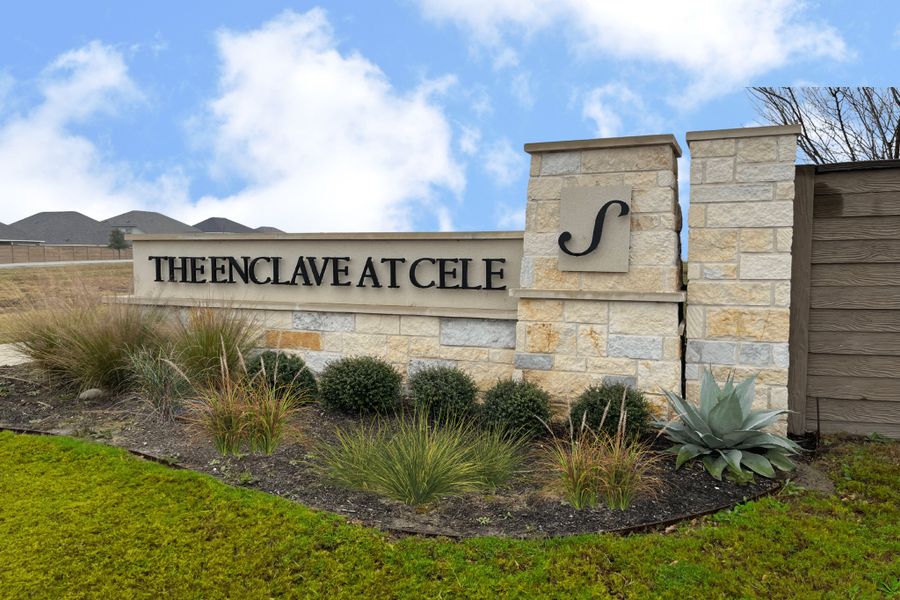 Entrance to the Enclave At Cele community in Pflugerville, TX, featuring signage and landscaping (Image 13).