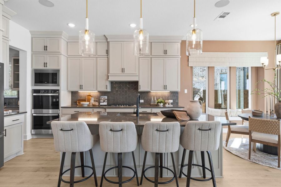 Furnished interior in a model home at Chaparral Park in Oak Point (Image 33).