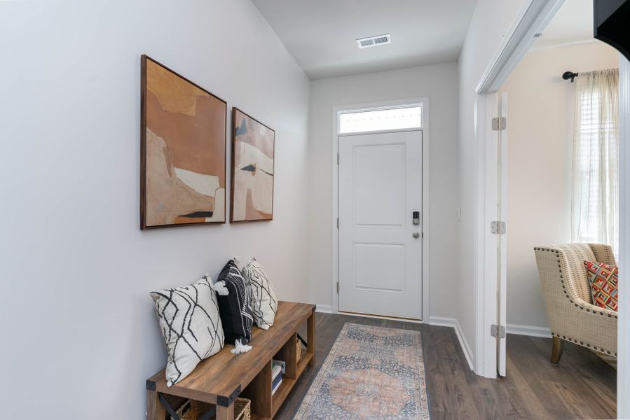 Furnished interior in a model home at Island Green in Myrtle Beach (Image 6).