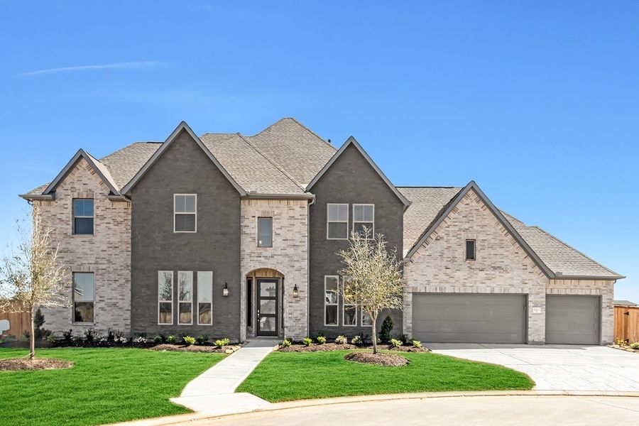 Front exterior of a home in the Towne Lake 80' community, located in Cypress, TX (Image 6). Front exterior of a home in the Towne Lake 80' community, located in Cypress, TX (Image 6).