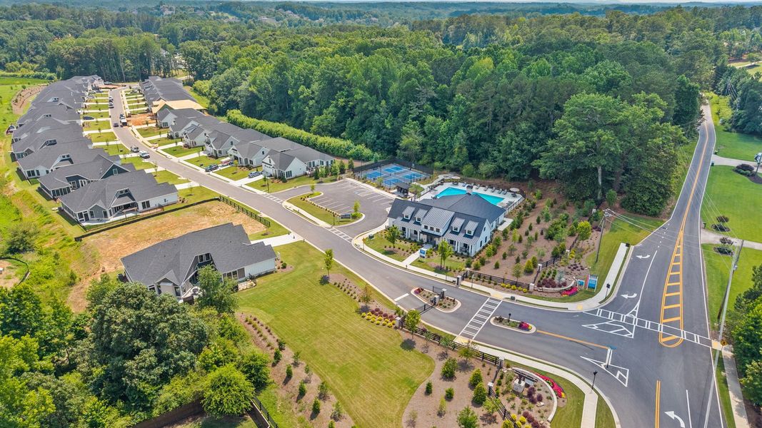 Aerial view of the The Courtyards by The Manor community in Alpharetta, GA, showing layout and nearby surroundings (Image 1). Aerial view of the The Courtyards by The Manor community in Alpharetta, GA, showing layout and nearby surroundings (Image 1).