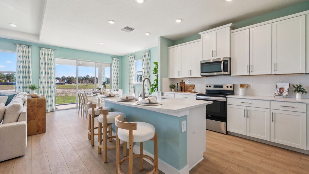Furnished interior in a model home at Tartan Farms at Winding Oaks in Ocala (Image 5).