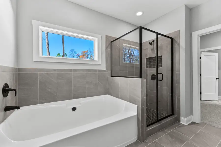 Furnished interior in a model home at Deer Creek in Moreland (Image 8).