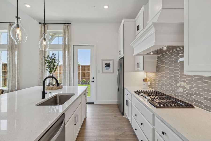 Furnished interior in a model home at Newman Village Townhomes in Frisco (Image 25).