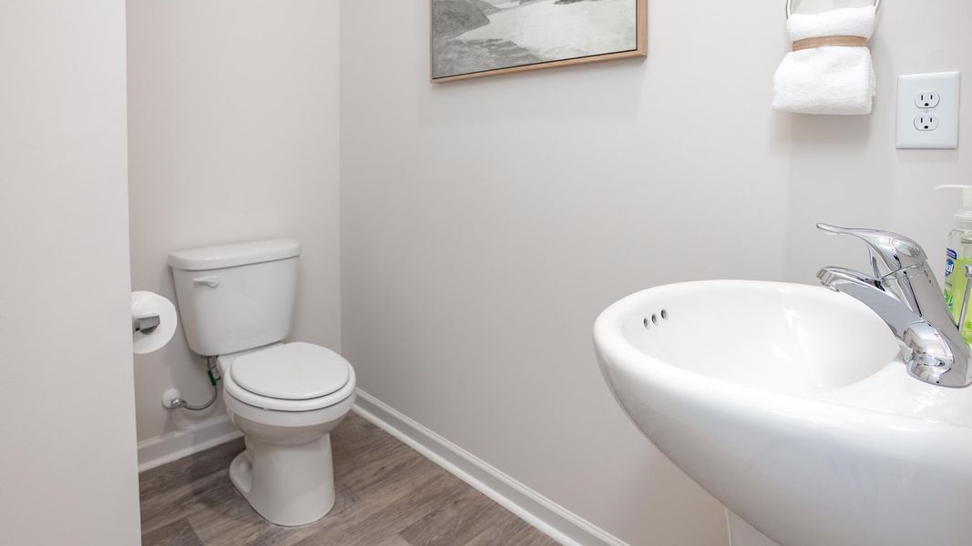 Furnished interior in a model home at The Townes at Riley's Meadow in Haw River (Image 10).