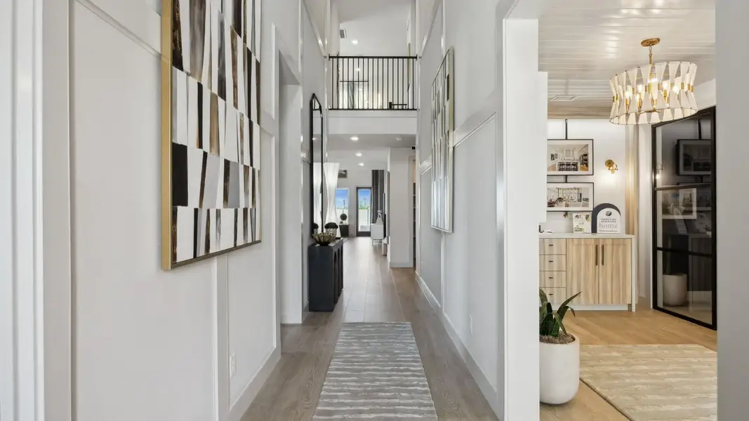 Furnished interior in a model home at Painted Tree - Woodland West in McKinney (Image 9).