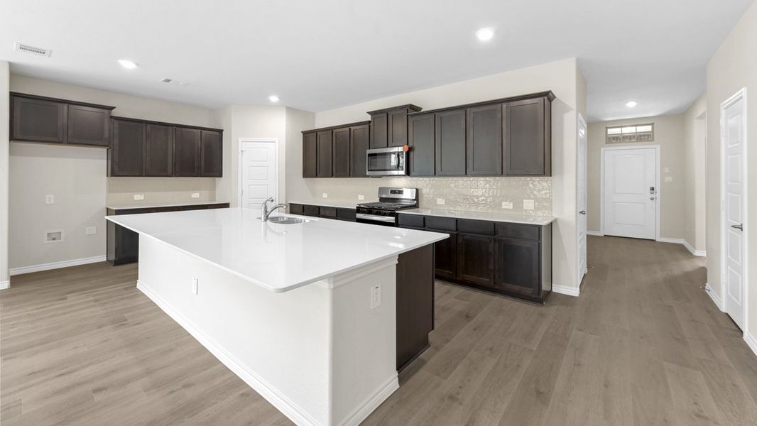 Furnished interior in a model home at Windchime in Celina (Image 10).